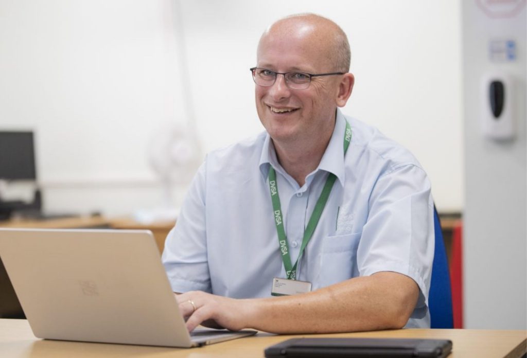 DVSA Engineering professional working at his laptop.